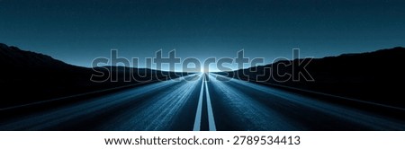 A panoramic view of an empty highway at dusk, with bright lights illuminating the road ahead, leading towards a distant horizon.