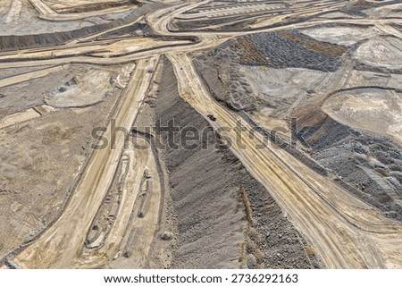 Panoramic view of enormous mining roads for the transport of minerals and mine waste