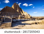 Panoramic view of eroded rock formation peaks along the Door Trail at Badlands National Park, South Dakota