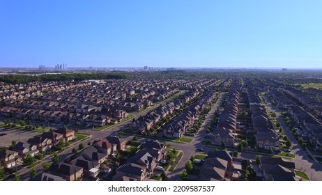 Panoramic View At Established Neighbourhood With Town Home Cottage Style Houses In Canada. Top Aerial View At Middle Class Family Homes With Large Backyard And Green Front Yards. Very Clean Area.