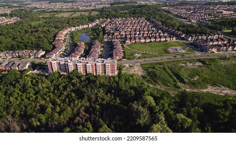 Panoramic View At Established Neighbourhood With Town Home Cottage Style Houses In Canada. Top Aerial View At Middle Class Family Homes With Large Backyard And Green Front Yards. Very Clean Area.