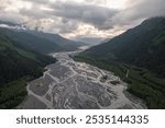 Panoramic view of Exit Glacier river and mountains landscape - streams from Alaskan glaciers and Harding Icefield in Kenai Fjords National Park near Seward, Alaska