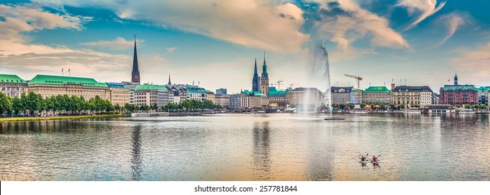 Panoramic view of famous Binnenalster (Inner Alster Lake) in golden evening light at sunset, Hamburg, Germany - Powered by Shutterstock