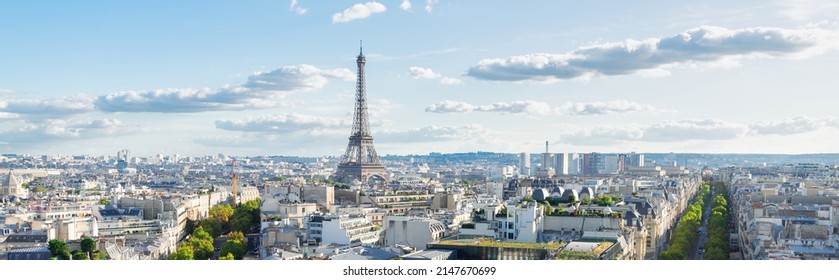 panoramic view of famous Eiffel Tower landmark and Paris boulevard streets, Paris France