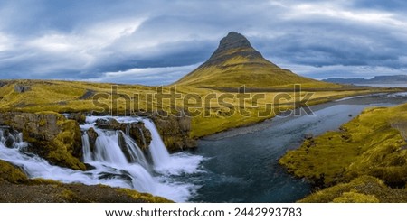 Panoramic view of famous Kirkjufell mountain with Kirkjufellsfoss water falls in Iceland