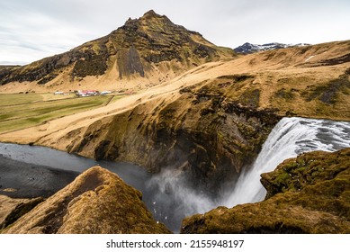Panoramic view of the famous Skógafoss waterfall and the nearby Drangshlíðarfjall mountain, Laugavegur hiking trail, Iceland