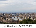 Panoramic view of Florence, Italy in Piazzale Michelangelo (Michelangelo Square). The view captures the heart of Florence from Forte Belvedere to Santa Croce, across the walkways and the bridges.