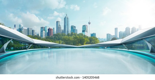 Panoramic View Of Futuristic Geometric Shapes Design Empty Floor With Morden City Skyline . Morning Scene .