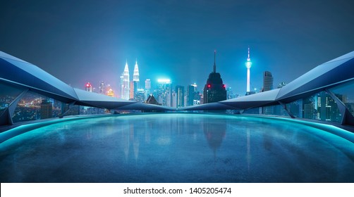 Panoramic View Of Futuristic Geometric Shapes Design Empty Floor With Kuala Lumpur City Skyline . Night Scene .