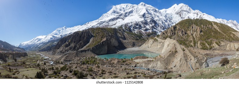 Panoramic view to Gangapurna peak and Gangapurna lake, trekking around Annapurna Curcuit in spring, Nepal.