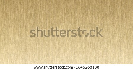 Panoramic view of gold metallic texture background. brushed brass texture.