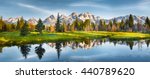 Panoramic view of Grand Teton range in Grand Teton National Park. Grand Teton National Park is in Wyoming, USA. Also, Grand Teton range is a range of mountains part of the US Rockies.