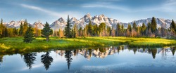 Panoramic View Of Grand Teton Range In Grand Teton National Park. Grand Teton National Park Is In Wyoming, USA. Also, Grand Teton Range Is A Range Of Mountains Part Of The US Rockies.