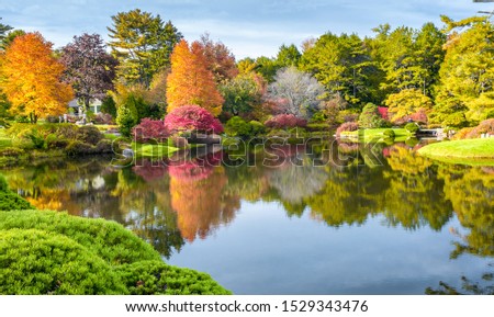 Panoramic view of Hadlock Pond in foliage season. Tree colors of Acadia National Park, Maine.