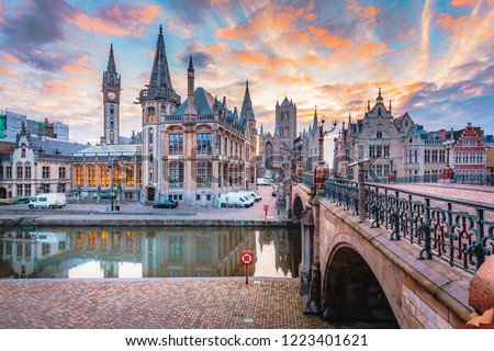 Panoramic view of the historic city center of Ghent with Leie river illuminated in beautiful twilight, Ghent, East Flanders, Belgium