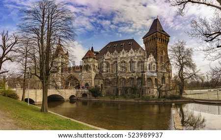 Panoramic view of the Historical Vajdahunyad Castle with lake in City Park located behind the Heroes Square in Budapest, Hungary