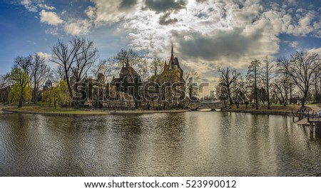 Panoramic view of the Historical Vajdahunyad Castle with lake in City Park located behind the Heroes Square in Budapest, Hungary