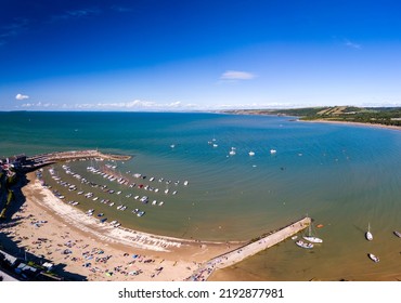 Panoramic View Of The Holiday Resort Town Of New Quay On The West Wales Coast In Mid Summer (Cardigan Bay)