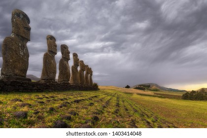 Panoramic View Of The Idols Of Easter Island With A Broad Perspective On The Far Hills.