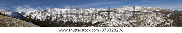 Panoramic view of the Indian\
Peaks Wilderness from the trails above Eldora , near Boulder,\
Colorado.
