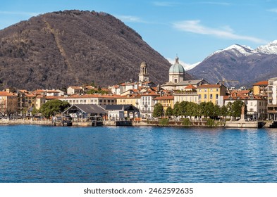 Panoramic view of the Intra town from Lake Maggiore with snow-capped mountains in the background, Verbania, Piedmont, Italy - Powered by Shutterstock