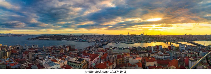 Panoramic view of Istanbul at sunset from Galata Tower. Golden Horn, Bosphorus, Historical Peninsula of the Istanbul and Karakoy on the scene. Dramatic clouds. Istanbul panorama. - Shutterstock ID 1916741942