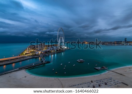 Panoramic view of the JBR beach and Bluewaters Island Dubai on a cloudy morning.