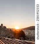 Panoramic view of Kavala city Greece from the Byzantine fortress or castle, near Panagia church, sunset colors.