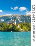 Panoramic view of Lake Bled with St. Marys Church on the small island. Bled, Slovenia, Europe.