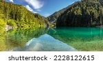 Panoramic view of Lindeman Lake in Chilliwack Provincial Park on a calm Summer morning.