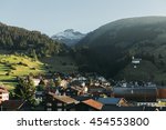 Panoramic view of little town Breil/Brigels, Switzerland with Sogn Sieve church in the middle