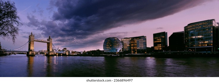 Panoramic view of London city and Tower Bridge and the Thames at sunset - Shutterstock ID 2366896497