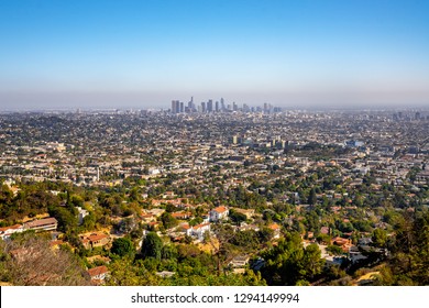 Panoramic view of Los Angeles downtown with many skyscrapers on the horizon.