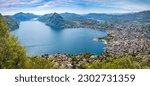 Panoramic view of Lugano town and Lugano Lake from Monte Bre mountain.