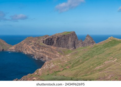 Panoramic view of majestic Atlantic Ocean coastline at Ponta de Sao Lourenco peninsula, Canical, Madeira island, Portugal, Europe. Coastal hiking trail along steep rocky rugged cliffs. Sea breeze. Awe - Powered by Shutterstock