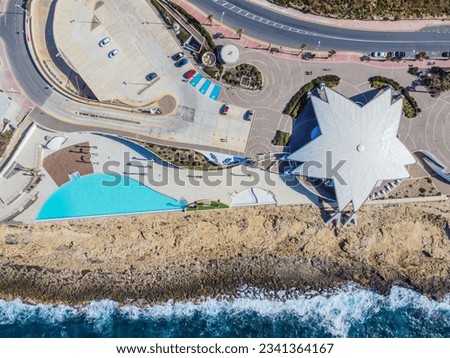 Panoramic view of Malta National Aquarium (Located in Qawra) and an incredibly beautiful beach. San Paul il Bahar (San Pawl il-Baħar). Bugibba. Aero Photography. View from flying drone. St Paul's Bay