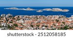 Panoramic view of Marseille rooftops and the Mediterranean Sea with Ile Pomegues, Ile du Frioul, Ile Ratonneau and Ile d