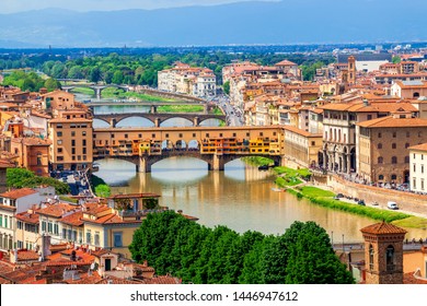 Panoramic view of medieval stone bridge Ponte Vecchio over Arno river in Florence (Firenze), Tuscany, Italy, Europe. Florence cityscape. Architecture and landmark of Florence and Italy