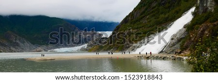 Panoramic view of Mendenhall Glacier and Nugget Falls located in Mendenhall Valley near Juneau, Alaska
