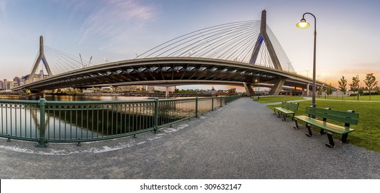 Panoramic view of the modern architecture of the Zakim Bridge in Boston, Massachusetts, USA at sunset.