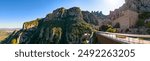 Panoramic view of Montserrat mountain in Catalonia with its monastery located on the heights during a sunny spring afternoon