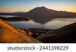 Panoramic view of Mount Konocti and Clear Lake landscape in Lake County, California during golden hour sunset 