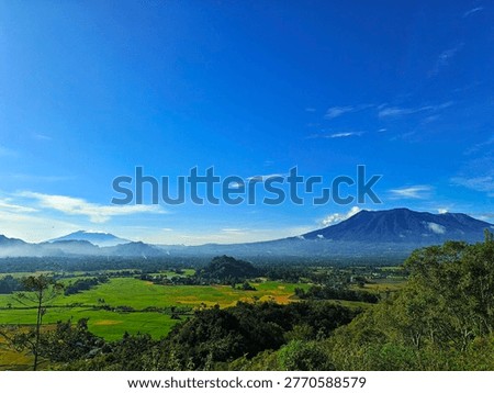 Panoramic View of Mount Marapi and Mount Sago Over Agam Rice Valley and Bukittinggi, West Sumatra — Lush Terraces, Misty Volcanoes, Minangkabau Heritage Landscape