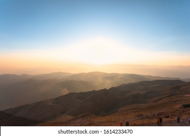 Panoramic view of the mountain landscape at sunset. Mountain silhouettes. View from Mount Tahtali near Kemer to Taurus Mountains, Turkey