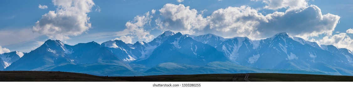 Panoramic view of the mountain range, blue haze