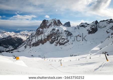 Panoramic view of mountain ski resort in sunny day, Italy