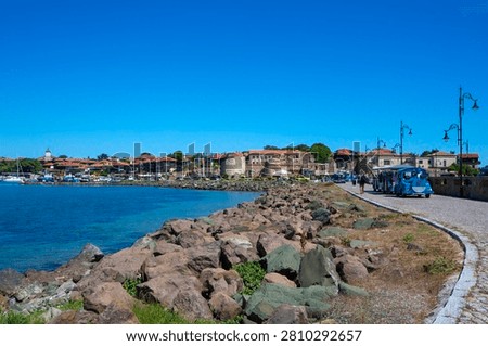 Panoramic View of Nesebar Old Town Peninsula with Sea Coast and Tourist Train in Bulgaria