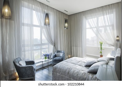 panoramic view of nice cozy bedroom