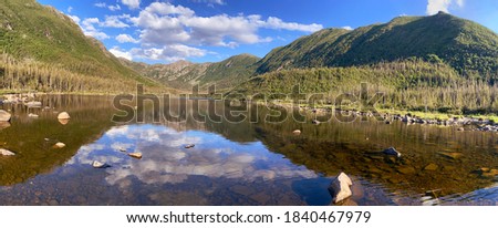 Panoramic view with nice reflections of Lac aux Americains, Gaspesie National Park, Quebec, Canada