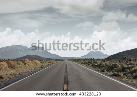 panoramic  view of nice summer empty road  through the mountain